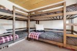 Bunk room with four twin beds
